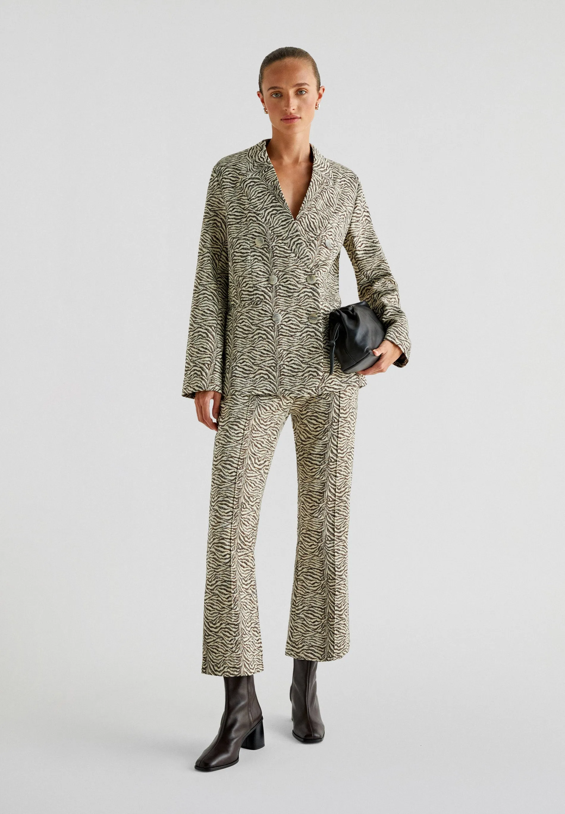 ANIMAL PRINT FLARED TROUSERS